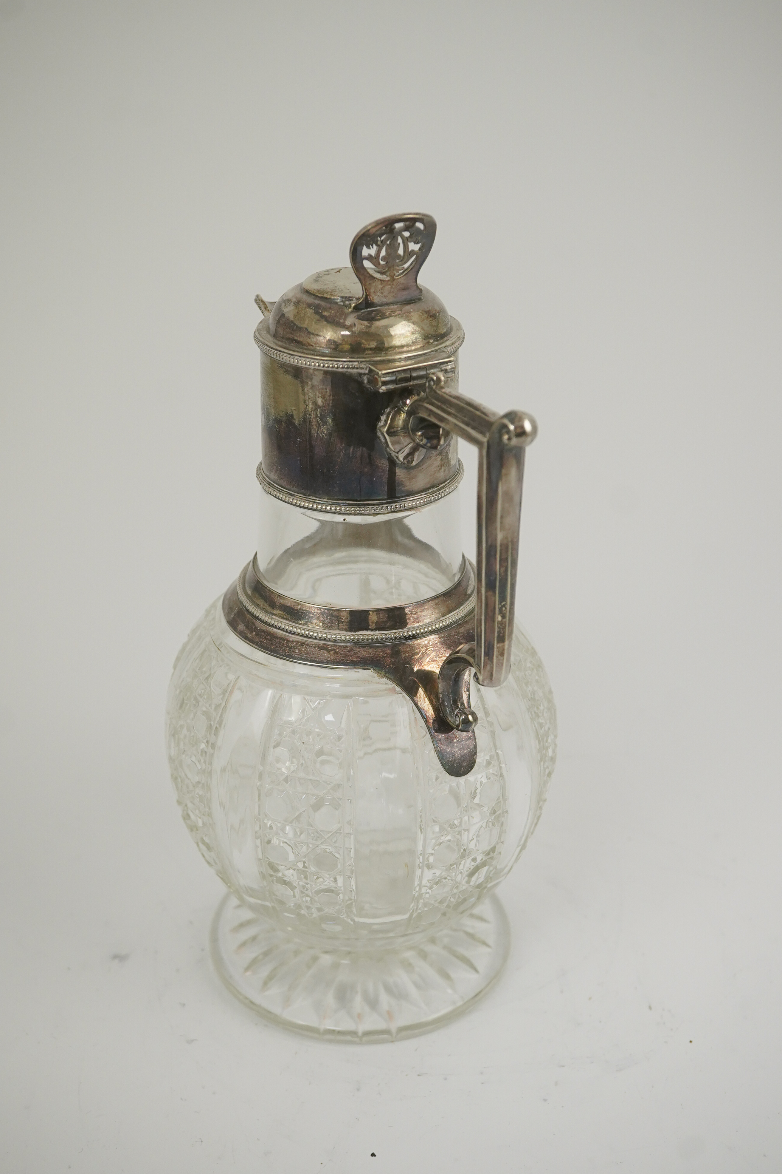 A late Victorian silver mounted cut glass claret jug, by Edward Hutton